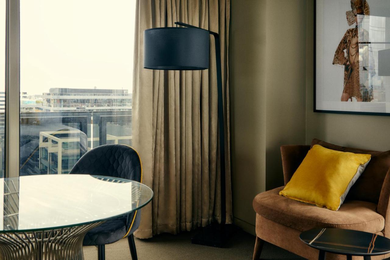 The Kinson Hotel Melbourne Exterior photo A floor lamp