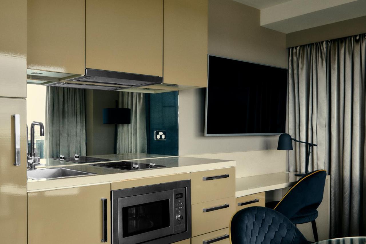 The Kinson Hotel Melbourne Exterior photo A kitchen in a serviced apartment